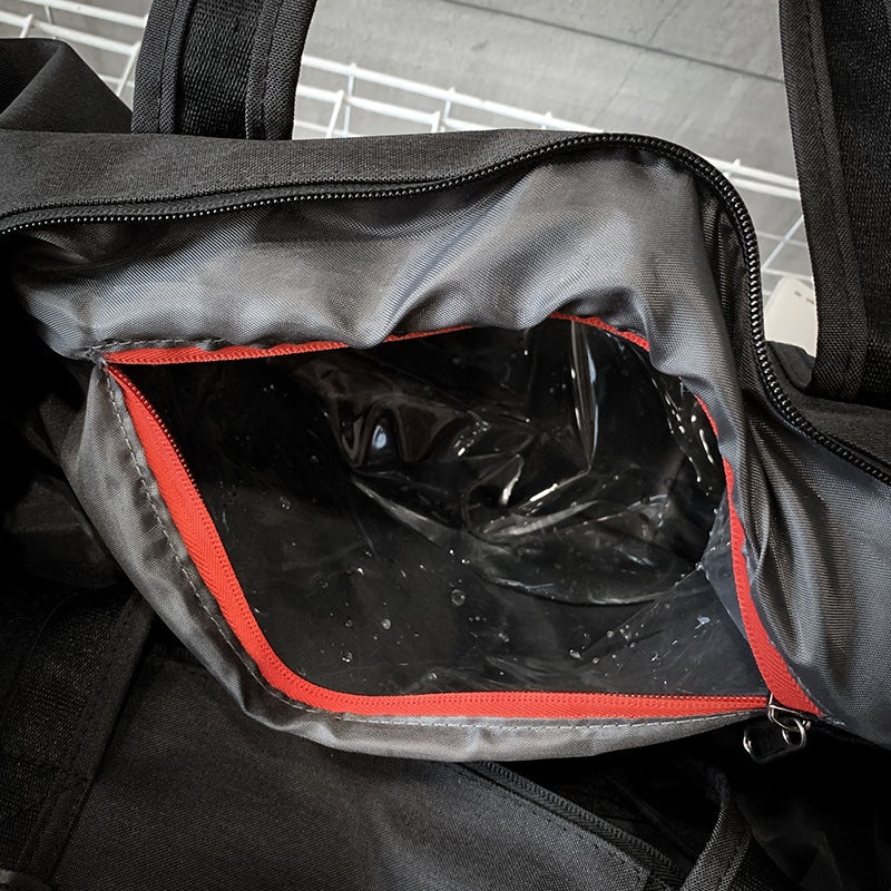Lined wet pocket inside the Wet/Dry Gym Duffel