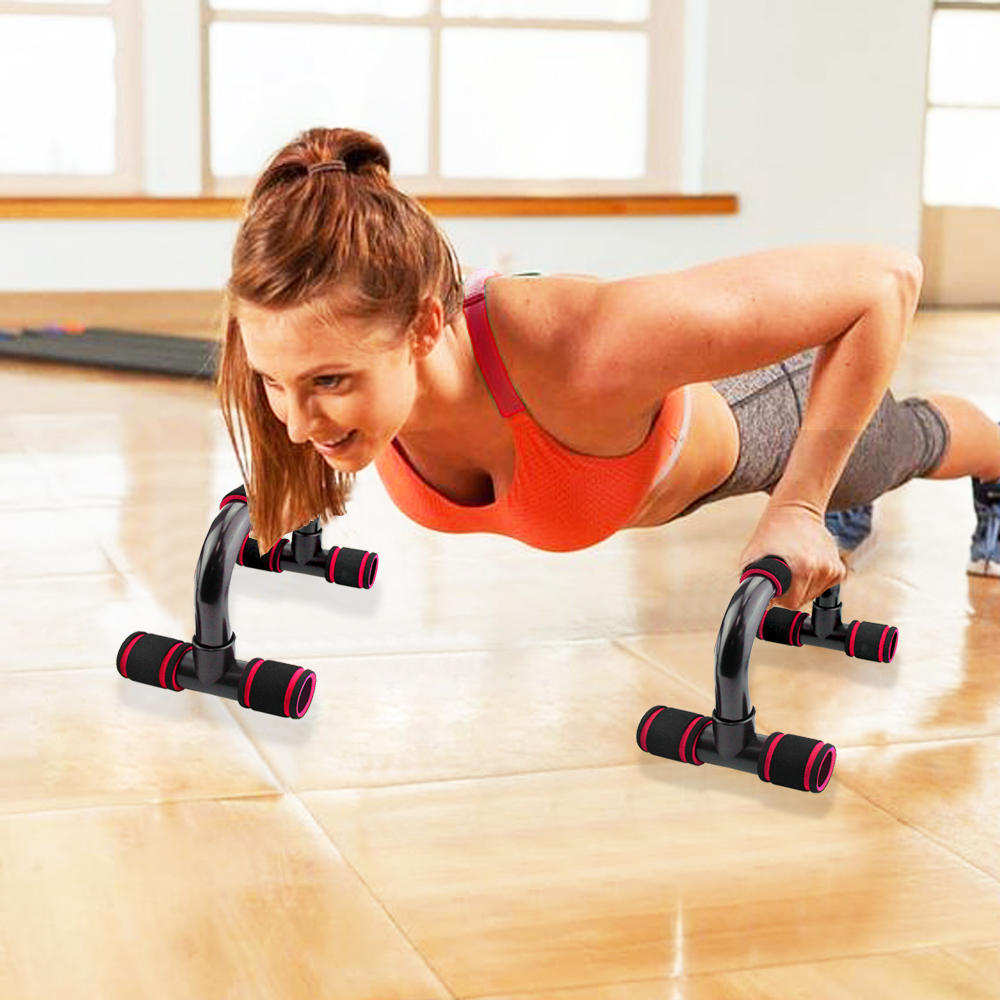 Foam Grip Push-Up Bars in black and red, in use for a push-up